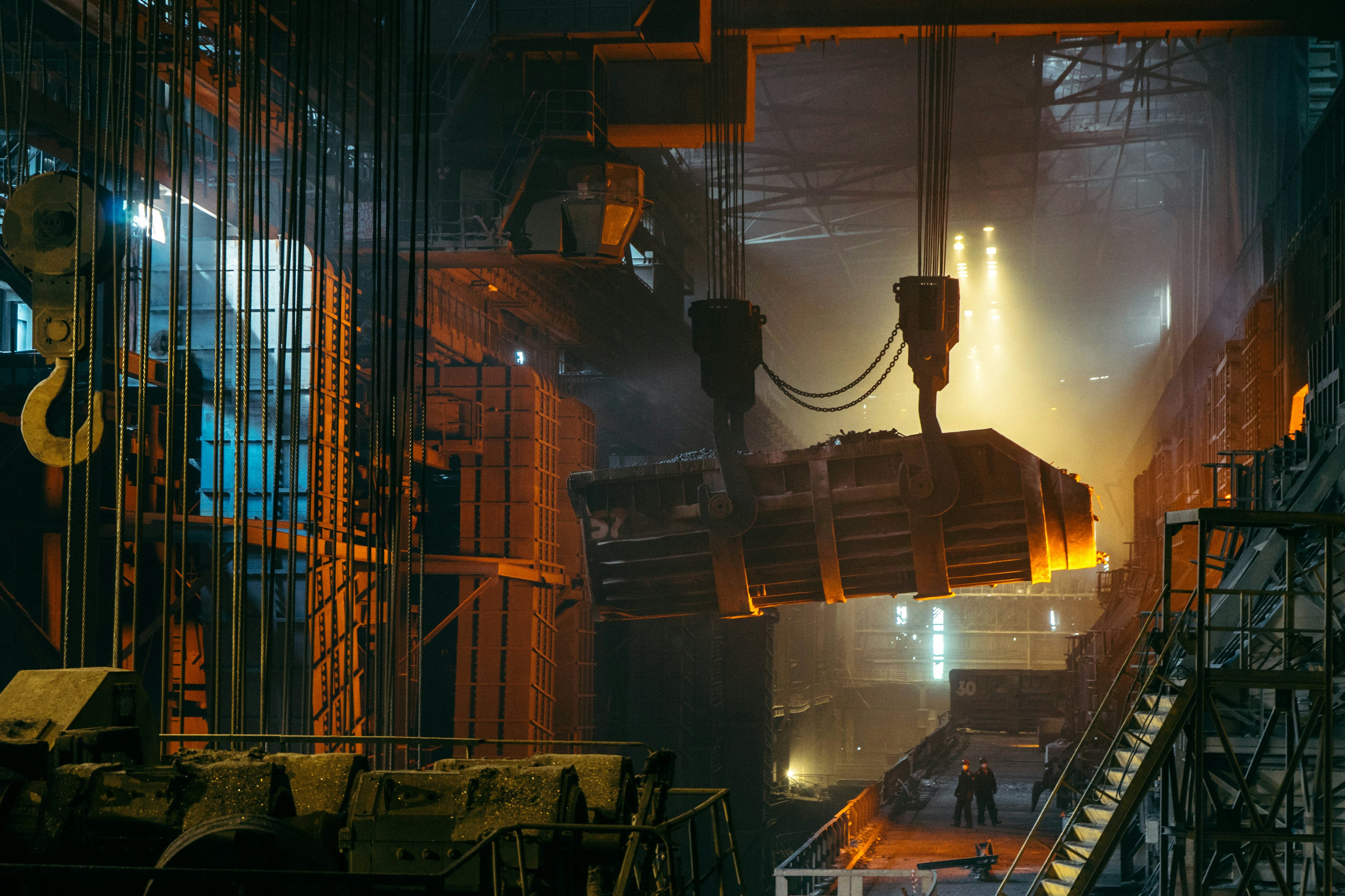 Steel mill crane pouring molten metal