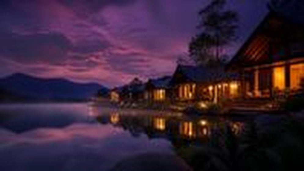 Boutique lakeside resort at dusk